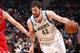 MINNEAPOLIS, MN - April 9: Kevin Love #42 of the Minnesota Timberwolves handles the ball against the Chicago Bulls during the game on April 9, 2014 at Target Center in Minneapolis, Minnesota. NOTE TO USER: User expressly acknowledges and agrees that, by downloading and or using this Photograph, user is consenting to the terms and conditions of the Getty Images License Agreement. Mandatory Copyright Notice: Copyright 2014 NBAE (Photo by David Sherman/NBAE via Getty Images)