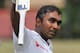 Sri Lankan cricketer Mahela Jayawardene celebrates his century during the first day of the second test cricket match between Sri Lanka and South Africa in Colombo, Sri Lanka, Thursday, July 24, 2014. (AP Photo/Sanka Gayashan)
