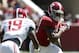 Alabama running back Derrick Henry (27) caries the ball as Alabama linebacker Reggie Ragland (19) closes in during Alabama's A-Day NCAA college football spring game Saturday, April 19, 2014, in Tuscaloosa, Ala. (AP Photo/Butch Dill)