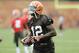 Cleveland Browns wide receiver Josh Gordon runs after a catch during organized team activities at the NFL football team's facility in Berea, Ohio Wednesday, May 28, 2014. (AP Photo/Mark Duncan)