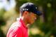 HOYLAKE, ENGLAND - JULY 20: Tiger Woods of the United States walks off the 5th tee during the final round of The 143rd Open Championship at Royal Liverpool on July 20, 2014 in Hoylake, England. (Photo by Tom Pennington/Getty Images)