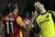 Galatasaray's Didier Drogba, left, greets Chelsea's Petr Cech at the end of the Champions League round of 16 second leg soccer match between Chelsea and Galatasaray at Stamford Bridge stadium in London Tuesday, March 18, 2014. (AP Photo/Kirsty Wigglesworth)
