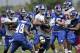 New York Giants' Michael Cox runs through traffic during a NFL football camp in East Rutherford, N.J., Tuesday, July 22, 2014. (AP Photo/Seth Wenig)