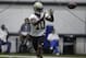 New Orleans Saints first round draft pick Brandin Cooks (10) works out during OTA workouts at their NFL football training facility in Metairie, La., Thursday, June 19, 2014. (AP Photo/Gerald Herbert)