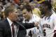 Gonzaga head coach Mark Few, left, congratulates Kevin Pangos (4) and Gary Bell, Jr. (5) as they lead with time running down in the second half of an NCAA tournament second-round college basketball game against West Virginia, Thursday, March 15, 2012, in Pittsburgh. Gonzaga won 77-54 to advance to the next round. (AP Photo/Keith Srakocic)