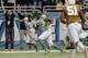 Oregon's Derrick Malone (22) returns an interception for a touchdown against Texas during the second half of the Valero Alamo Bowl NCAA college football game, Monday, Dec. 30, 2013, in San Antonio. (AP Photo/Eric Gay)