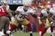 San Francisco 49ers guard Alex Boone (75) blocks during the second half of an NFL football game against the Tampa Bay Buccaneers on Sunday, Dec. 15, 2013, in Tampa, Fla. The 49ers won 33-14. (AP Photo/Reinhold Matay)