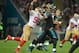 Oct 27, 2013; London, UNITED KINGDOM; Jacksonville Jaguars quarterback Chad Henne (7) is pressured by San Francisco 49ers linebacker Corey Lemonier (96) during an International Series game at Wembley Stadium. Mandatory Credit: Bob Martin-USA TODAY Sports