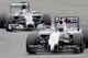 Williams driver Valtteri Bottas, right, of Finland steers his car ahead of Mercedes driver Lewis Hamilton, left, of Britain during the German Formula One Grand Prix in Hockenheim, Germany, Sunday, July 20, 2014. Bottas placed second ahead of third placed Hamilton. (AP Photo/Petr David Josek)