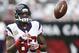 Houston Texans' Andre Johnson flips the ball to quarterback Case Keenum as the team warms up prior to an NFL football game against the Arizona Cardinals on Sunday, Nov. 10, 2013, in Glendale, Ariz. (AP Photo/Ross D. Franklin)