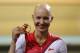England's Joanna Rowsell celebrates with her gold medal after winning the women's 3000m Individual pursuit at the Velodrome in Glasgow, Scotland, Friday July 25, 2014. (AP Photo/Scott Heppell)