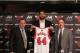 CHICAGO, IL - JULY 18: Chicago Bulls head coach Tom Thibodeau and general manager Gar Forman introduce newly-signed free agent Nikola Mirotic, accompanied by guest translator Igor Ormazabal, during a press conference at the United Center on July 18, 2014 in Chicago, Illinois. NOTE TO USER: User expressly acknowledges and agrees that, by downloading and or using this Photograph, user is consenting to the terms and conditions of the Getty Images License Agreement. Mandatory Copyright Notice: Copyright 2014 NBAE (Photo by Gary Dineen/NBAE via Getty Images)