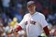 Boston Red Sox's Jake Peavy walks to the dug out after pitching in the fourth inning of a baseball game against the Baltimore Orioles in Boston, Sunday, July 6, 2014. (AP Photo/Michael Dwyer)