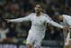 Real's Isco celebrates scoring his side's first goal during a Champions League quarterfinal first leg soccer match between Real Madrid and Borussia Dortmund at the Santiago Bernabeu stadium in Madrid, Spain, Wednesday April 2, 2014. (AP Photo/Paul White)