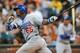 SAN FRANCISCO, CA - JULY 25: Yasiel Puig #66 of the Los Angeles Dodgers hits a double in the top of the third inning against the San Francisco Giants at AT&T Park on July 25, 2014 in San Francisco, California. (Photo by Thearon W. Henderson/Getty Images)