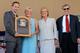 COOPERSTOWN, NY - JULY 22: Vicki Santo (2nd L), widow of inductee Ron Santo, poses for a photograph with his plaque with (L-R) Baseball Hall of Fame president Jeff Idelson, Hall of Fame chairman Jane Forbes Clark and MLB commissioner Bud Selig at Clark Sports Center during the Baseball Hall of Fame induction ceremony on July 22, 2012 in Cooperstown, New York. Santo was named to nine All-Star games in his 15 major league seasons, 14 of which he played for the Chicago Cubs. He finished his career with 2,254 hits, 1,331 runs batted in, 342 home runs and won 5 consecutive gold gloves at third base from 1964-1968. Santo passed away on December 2, 2010. (Photo by Jim McIsaac/Getty Images)