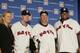 Baseball Hall of Fame owner Jane Forbes Clark, left, poses with the 2014 Baseball Hall of Fame inductees Tom Glavine, second from left, Greg Maddux, center, and Frank Thomas, right, after the trio donned their Hall of Fame caps and jerseys during a press conference Thursday, Jan. 9, 2014, in New York. Glavine and Maddux pitched for the Atlanta Braves and Thomas was a Chicago White Sox slugger. (AP Photo/Kathy Willens)