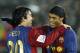 European champion FC Barcelona Ronaldinho of Brazil, right, is congratulated by his teammate Deco of Portugal after he scored the Spanish team's third goal against their North and Central American counterpart Club America of Mexico during the semi-final of Club World Cup soccer in Yokohama, near Tokyo, Thursday, Dec. 14, 2006. (AP Photo/David Guttenfelder)