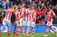 STOKE ON TRENT, ENGLAND - APRIL 12: Erik Pieters of Stoke City is mobbed after scoring a first half goal during the Barclays Premier League match between Stoke City and Newcastle United at Britannia Stadium on April 12, 2014 in Stoke on Trent, England. (Photo by Laurence Griffiths/Getty Images)
