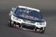 Kevin Harvick drives through turn one during practice for the Brickyard 400 Sprint Cup series auto race at the Indianapolis Motor Speedway in Indianapolis, Saturday, July 26, 2014. (AP Photo/Darron Cummings)