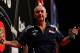LONDON, ENGLAND - MAY 22: Phil Taylor of England reacts during the McCoys Premier League Darts Play-Offs Semi Final match between Raymond van Barneveld and Phil Taylor at O2 Arena on May 22, 2014 in London, England. (Photo by Ben Hoskins/Getty Images)