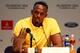 GLASGOW, SCOTLAND - JULY 26: Athlete Usain Bolt of Jamaica responds to a question as he attends a press conference and photocall at the Main Press Centre (MPC) during day three of the Glasgow 2014 Commonwealth Games on July 26, 2014 in Glasgow, United Kingdom. (Photo by Cameron Spencer/Getty Images)