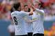 DENVER, CO - JULY 26: Wayne Rooney #10 of Manchester United celebrates his second goal with Juan Mata #8 during the first half of an International Champions Cup match against AS Roma at Sports Authority Field at Mile High on July 26, 2014 in Denver, Colorado. (Photo by Justin Edmonds/Getty Images)