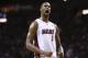 Miami Heat's Chris Bosh reacts after LeBron James scored a three point shot during the second half of an NBA basketball game in Miami, Monday, March 10, 2014 against the Washington Wizards. The Heat won 99-90. (AP Photo/J Pat Carter)