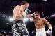 Jul 26, 2014; New York, NY, USA; Gennady Golovkin (white gloves) and Daniel Geale (black gloves) box during their middleweight championship bout at Madison Square Garden. Golovkin won via third round knockout. Mandatory Credit: Joe Camporeale-USA TODAY Sports