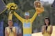 2014 Tour de France cycling race winner Italy's Vincenzo Nibali, wearing the overall leader's yellow jersey, celebrates on the podium in Paris, France, Sunday, July 27, 2014. (AP Photo/Christophe Ena)