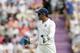 India's captain and wicketkeeper Mahendra Singh Dhoni gives a teammate fielding instructions during the first day of the third cricket test match of the series between England and India at The Ageas Bowl in Southampton, England, Sunday, July 27, 2014. (AP Photo/Matt Dunham)