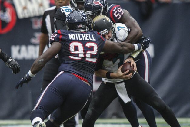 After Rough Childhood, Dolphins DT Earl Mitchell Is Driven to Succeed