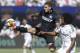 Inter Milan's Mauro Icardi, left, misses a pass as Real Madrid's Derik Osede defends during the second half of a soccer game in the first round of the Guinness International Champions Cup, Saturday, July 26, 2014, in Berkeley, Calif. (AP Photo/Ben Margot)
