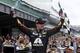 Jeff Gordon celebrates after winning the NASCAR Brickyard 400 auto race at Indianapolis Motor Speedway in Indianapolis, Sunday, July 27, 2014. (AP Photo/Darron Cummings)