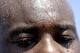 Sweat rolls down the face of Houston Texans cornerback Johnathan Joseph after an NFL football training camp practice Sunday, July 27, 2014, in Houston. (AP Photo/David J. Phillip)