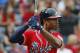 Atlanta Braves center fielder B.J. Upton (2) warms up before batting against the Philadelphia Phillies inning of a baseball game in Atlanta, Saturday, July 19, 2014.(AP Photo/John Bazemore)