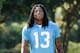 Carolina Panthers wide reciever Kelvin Benjamin walks to the practice field before an NFL football practice Wednesday, June 18, 2014 in Charlotte, N.C. (AP Photo/Nell Redmond)
