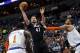 Minnesota Timberwolves' Kevin Love, center, shoots between New York Knicks' Amar'e Stoudemire, left, and Tyson Chandler, right, in the first quarter of an NBA basketball game, Wednesday, March 5, 2014, in Minneapolis. (AP Photo/Jim Mone)