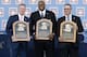 National Baseball Hall of Fame inductees Tom Glavine, Frank Thomas and Greg Maddux hold their plaques after an induction ceremony at the Clark Sports Center on Sunday, July 27, 2014, in Cooperstown, N.Y. (AP Photo/Mike Groll)