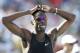 FILE - In this June 20, 2013 file photo, Torrin Lawrence reacts after his heat in the senior men's 400-meter dash at the U.S. Championships athletics meet in Des Moines, Iowa. Former University of Georgia 400-meter runner Torrin Lawrence died in a car accident early Monday, July 28, 2014 in Cordele, Ga. He was 25. (AP Photo/Charlie Neibergall, File)
