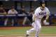 Tampa Bay Rays' Ben Zobrist follows the flight of his home run off Boston Red Sox starting pitcher John Lackey during the seventh inning of a baseball game Saturday, July 26, 2014, in St. Petersburg, Fla. (AP Photo/Chris O'Meara)