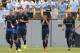 Jesus Navas (No. 15) reacts after scoring his goal against AC Milan.