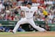 Boston Red Sox's Jon Lester pitches during the eighth inning of a baseball game against the Kansas City Royals in Boston, Sunday, July 20, 2014. (AP Photo/Michael Dwyer)