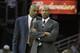 Cleveland Cavaliers assistant coach Paul Pressey, left, talks to head coach Byron Scott during an NBA basketball game against the Memphis Grizzlies Saturday, Nov. 27, 2010, in Cleveland. (AP Photo/Mark Duncan)