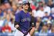 Colorado Rockies' Troy Tulowtizki reacts after a called strike while facing the St. Louis Cardinals in the fourth inning of a baseball game in Denver on Monday, June 23, 2014. (AP Photo/David Zalubowski)