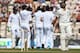 SOUTHAMPTON, ENGLAND - JULY 29: Rohit Sharma (R) of India shows his frustration after being caught by Stuart Broad off the bowling of Moeen Ali of England during day three of the 3rd Investec Test match between England and India at the Ageas Bowl at Ageas Bowl on July 29, 2014 in Southampton, England. (Photo by Michael Steele/Getty Images)