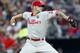Philadelphia Phillies starting pitcher A.J. Burnett works in the first inning of a baseball game against the Atlanta Braves in Atlanta, Friday, July 18, 2014. (AP Photo/John Bazemore)