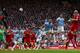 Liverpool's Martin Skrtel, right, scores against Manchester City during their English Premier League soccer match at Anfield Stadium, Liverpool, England, Sunday April 13, 2014. (AP Photo/Jon Super)