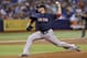 Boston Red Sox starting pitcher Jon Lester delivers to the Tampa Bay Rays during the third inning of a baseball game Friday, July 25, 2014, in St. Petersburg, Fla. (AP Photo/Chris O'Meara)