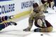 Patrick Brown (No. 23) kicks at the puck during a March 30 game between Boston College and UMass-Lowell.